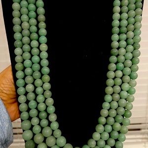 4 layer strand necklace jade beads. Selling for $200